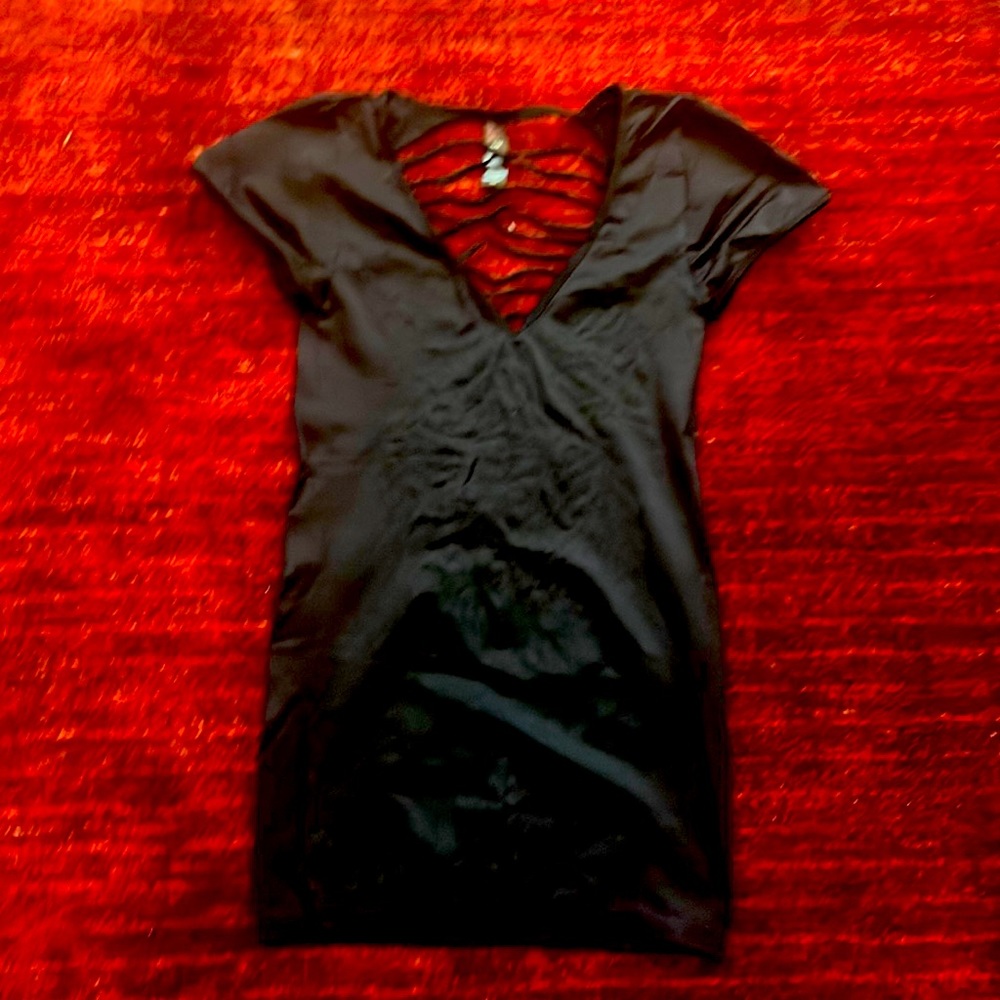 Stretchy mini dress. Size US 4-10. Black.